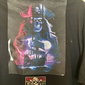 NWOT.  Men’s “ skull collection “ t shirt.  Never worn.   Size XL